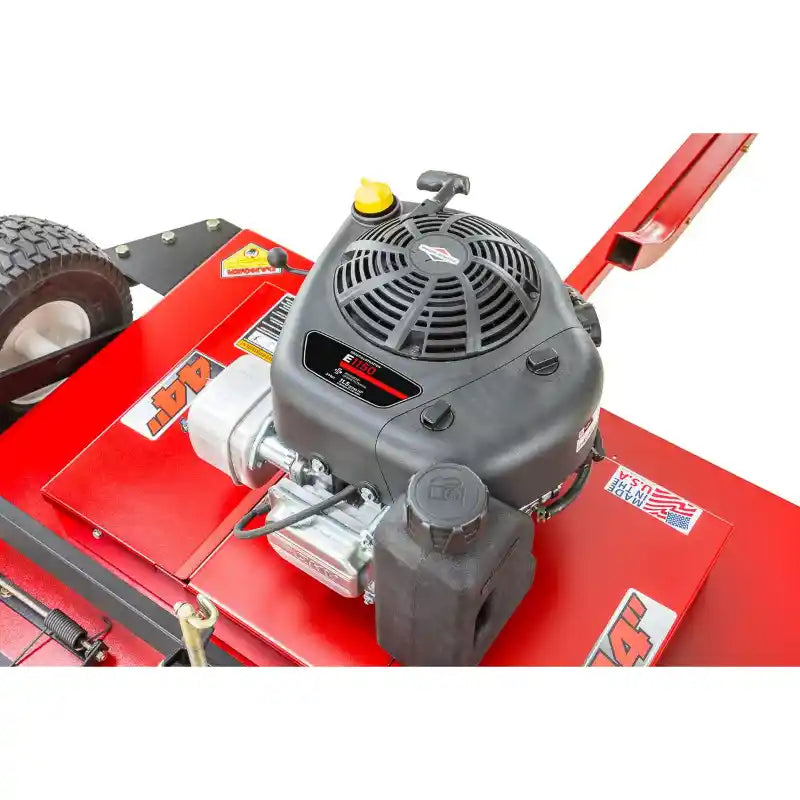 Close-up of Swisher 44-inch finish cut mower engine with fuel tank and red steel deck, gallery position 1