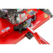 Close-up of Swisher 44-inch finish cut mower PTO shaft and tow-behind hitch with red steel deck, gallery position 1