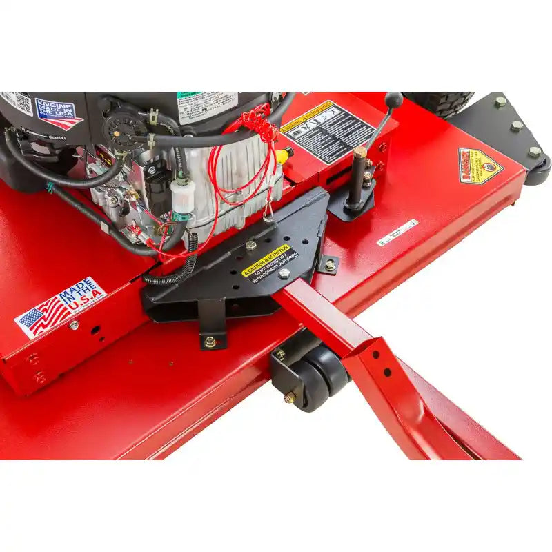 Close-up of Swisher 44-inch finish cut mower PTO shaft and tow-behind hitch with red steel deck, gallery position 1