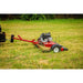 Tow-behind Swisher 44-inch finish cut mower with 11.5HP engine on grassy terrain, gallery position 1