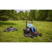 Swisher mower with 14.5HP engine towing 66-inch finish cut mower attachment on grass, gallery position 1