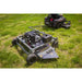 Swisher 66-inch finish cut mower with 14.5HP engine and fuel tank towing behind riding mower, gallery position 1