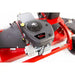 Close-up of Briggs & Stratton E1550 engine mounted on red Swisher 60-inch finish cut mower, gallery position 1
