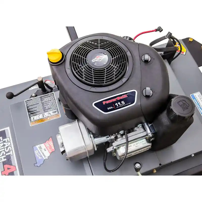 Close-up of Swisher 44-inch finish cut mower engine showing 11.5HP Briggs & Stratton motor, gallery position 1