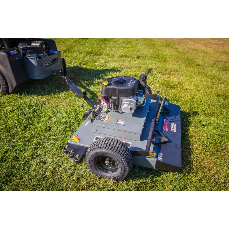 Swisher 44-inch finish cut mower with 11.5HP engine and tow bar on grass, angled view, gallery position 1