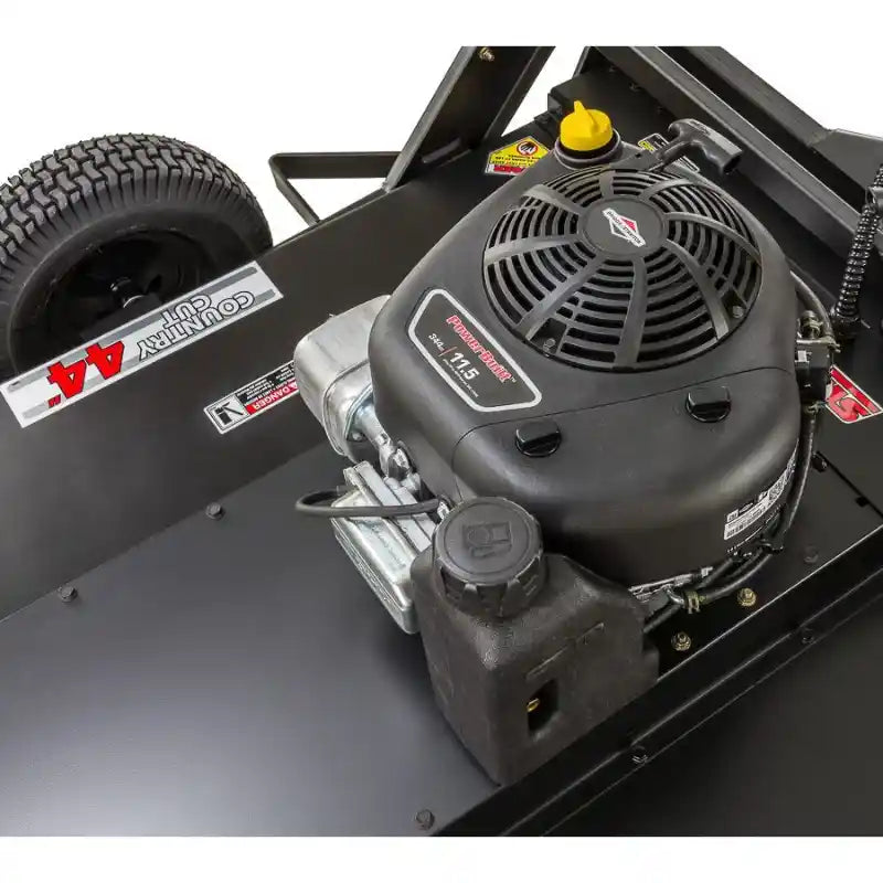 Close-up of 11.5HP Briggs & Stratton engine mounted on Swisher 44" Country Cut Rough Cut Mower, gallery position 1