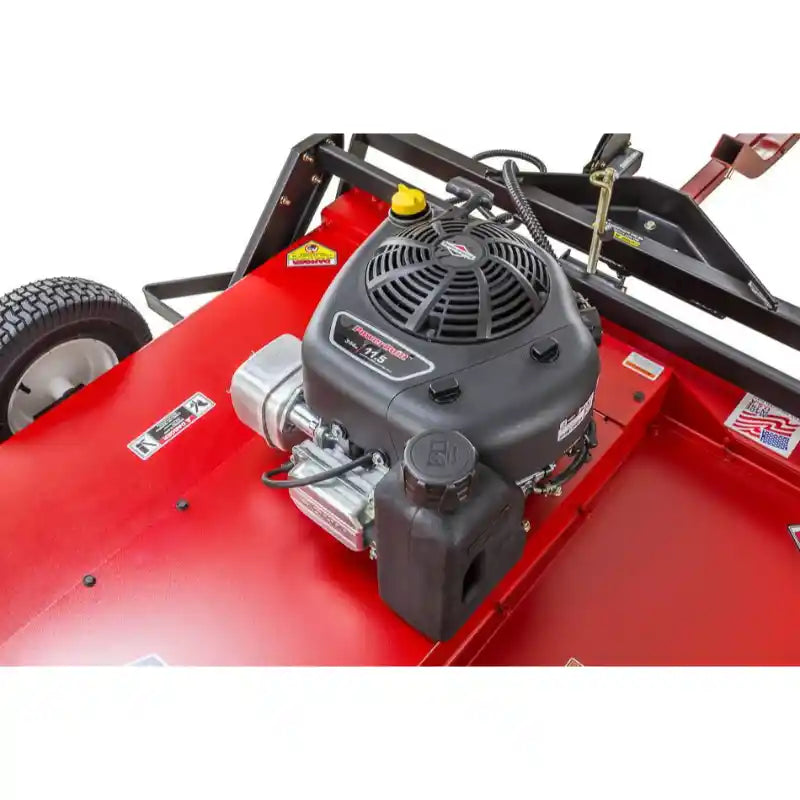 Close-up of 11.5HP engine mounted on red Swisher 44" rough cut brush mower deck, gallery position 1