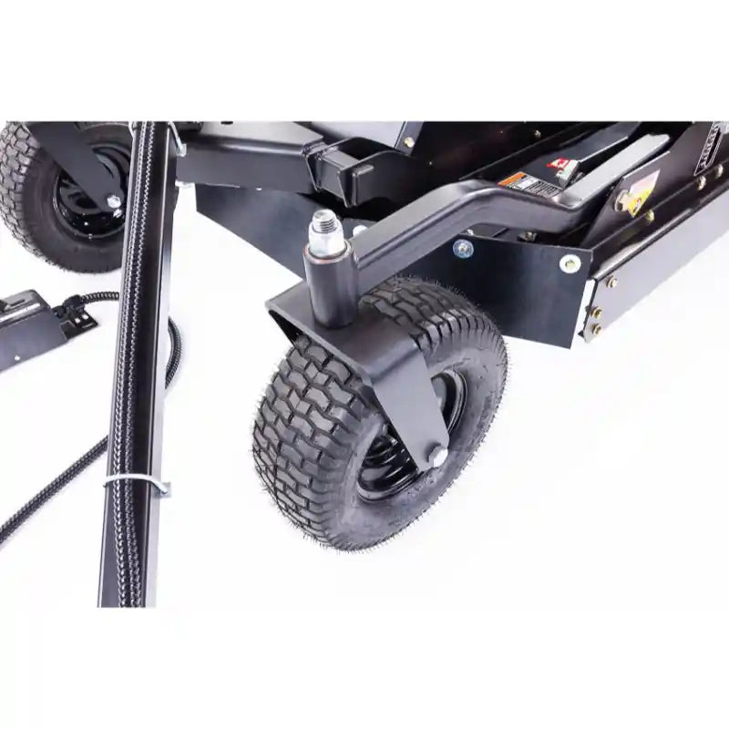 Close-up of front caster wheel and black welded frame on 14.5HP Kawasaki Swisher 44" brush cutter, gallery position 1