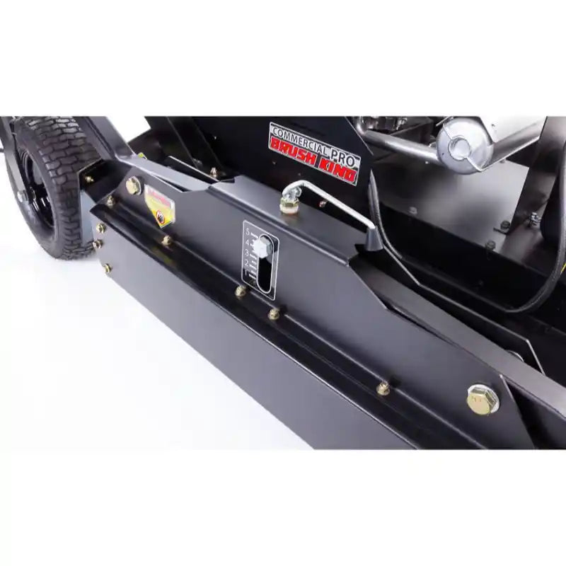 Close-up of black mower deck height gauge and hydraulic hose connection on Swisher 44" brush cutter, gallery position 1