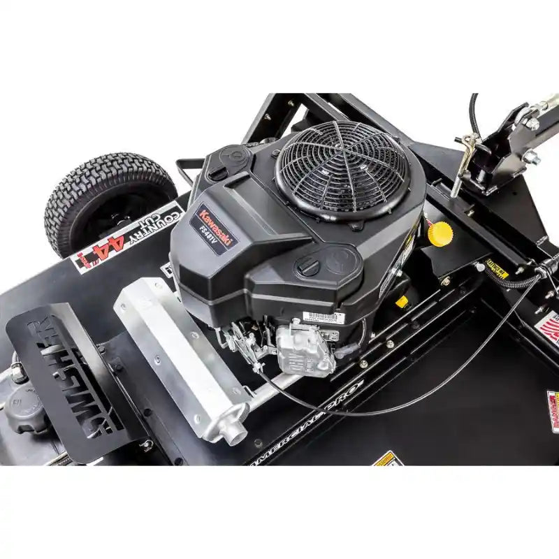 Close-up of 14.5HP engine and blade assembly on Swisher 44-inch rough cut mower, gallery position 1