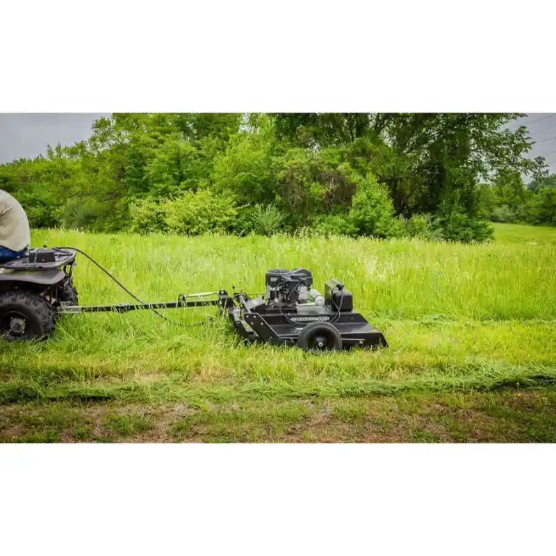 Tow-behind Swisher 44-inch rough cut mower with 14.5HP engine connected to ATV, gallery position 1