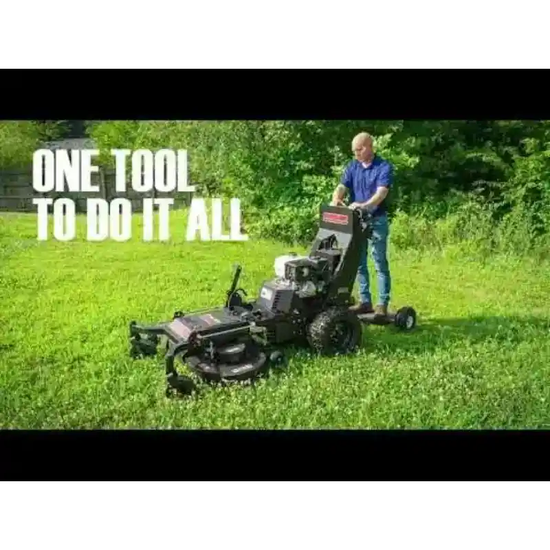 Operator standing behind Swisher 30-inch rough cut mower attachment on Versa ZTR, outdoor grass field, gallery position 1