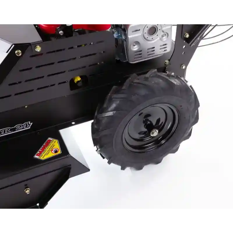 Close-up of rear tire and frame assembly on Swisher 24-inch walk-behind rough cut mower, gallery position 1