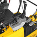 close-up of operator seat, control levers, pedals, and armrest on yellow MechMaxx MEC10 mini excavator gallery position 1