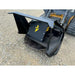 Black mulcher attachment with cutting teeth and protective steel housing mounted on skid steer loader on gravel