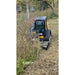 Skid steer with Stinger Attachments TF4 Twister brush cutter clearing dense brush in a wooded area, gallery image 10