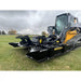 Skid steer with Stinger Attachments TF4 Twister brush cutter on grass, gallery image 11, 800x800 square view