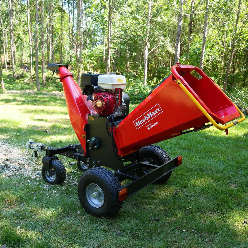 Three-quarter view of MechMaxx 6 inch Honda gas-powered drum wood chipper with open intake chute, gallery position 1