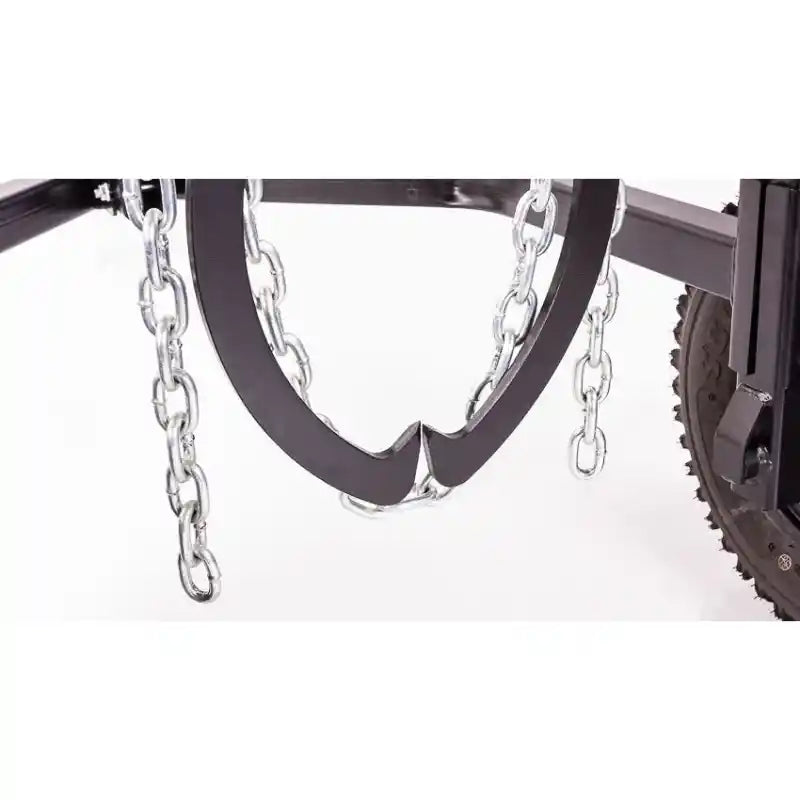 Close-up of black steel skidding claw with thick metal chains and part of pneumatic tire on Swisher ATV Log Skidder gallery 1.