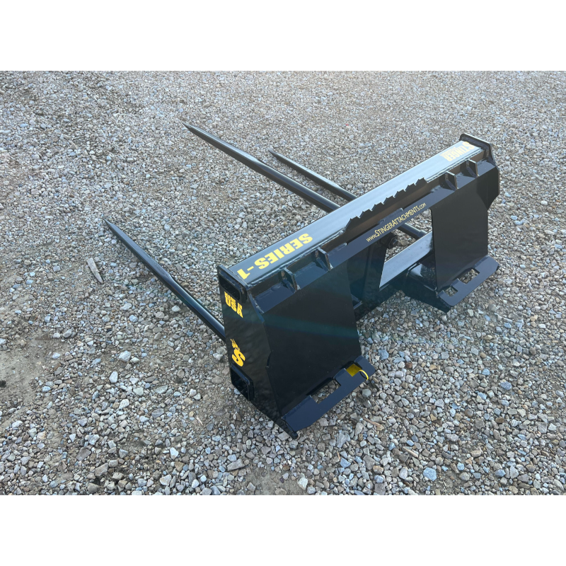 Stinger Attachments BS1 Series 1 Skid Steer Bale Spear with three large spears on gravel, gallery position 5, 800x800 square image