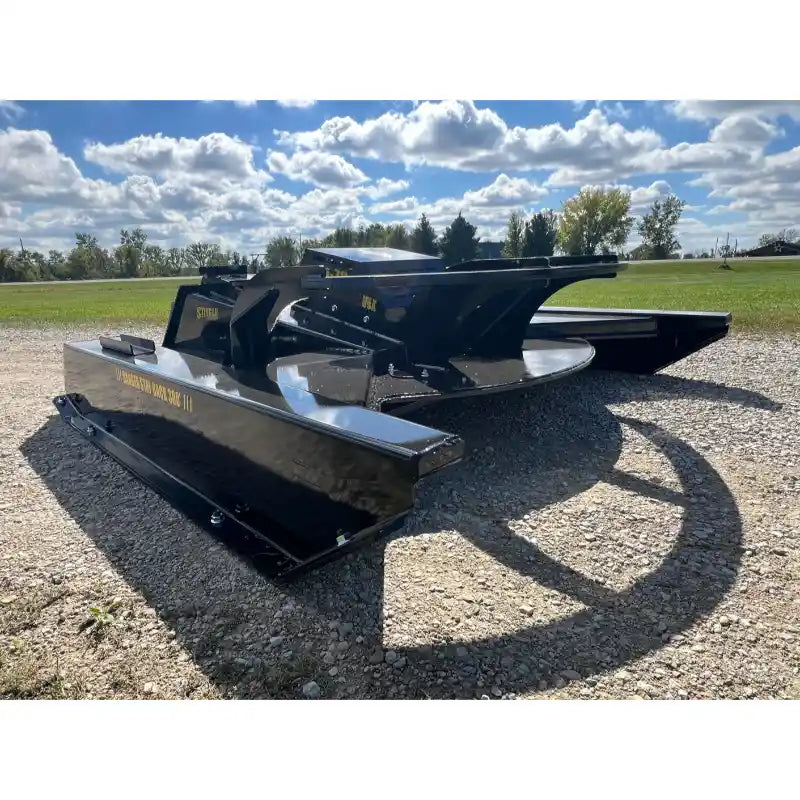 Stinger Attachments TF5 Twister skid steer brush cutter on gravel with blue sky background, gallery image 13, 800x800 square