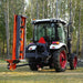 rear view of tractor with vertical orange MechMaxx 72-inch 3-point offset ditch bank mower at gallery position 1