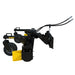 Black and yellow soil conditioning attachment with hydraulic hoses, disc blades, and adjustable steel frame on white background
