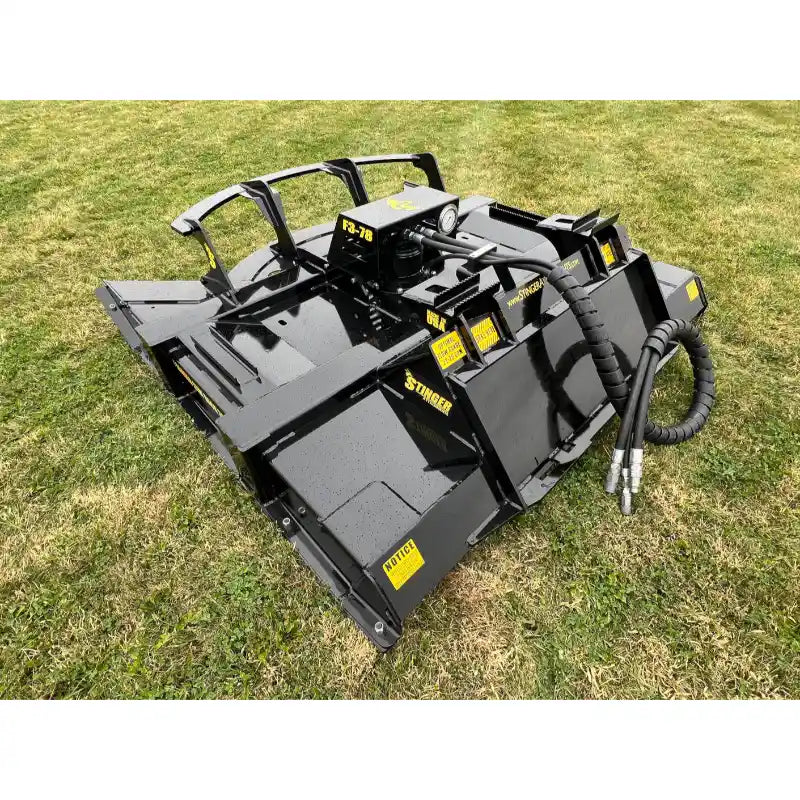 Stinger Attachments TF3 Twister skid steer brush cutter on grass, gallery position 6, 800x800 square image