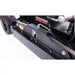 Close-up of black mower deck height gauge and hydraulic hose connection on Swisher 44" brush cutter, gallery position 1