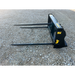 Stinger Attachments BS1 Series skid steer bale spear with three long spears on gravel surface, gallery 11 square shot