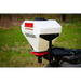 White Swisher ATV Commercial Pro Spreader mounted on ATV rear rack with wiring visible, gallery position 1
