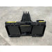 Black steel skid steer stump bucket attachment with reinforced edges and back connection mounts on concrete floor