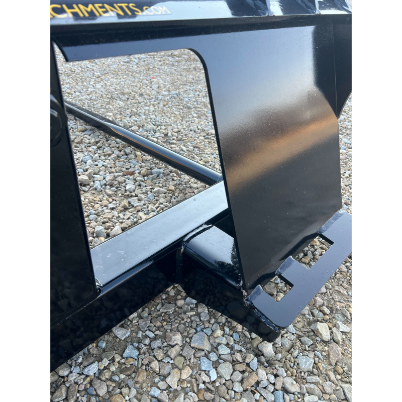 Close-up of Stinger Attachments BS1 Series skid steer bale spear showing skid-steer hookup and weld details, gallery 8.