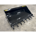 Black steel loader bucket attachment with nine tapered teeth and reinforced edges on concrete floor