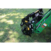Black steel mechanical grapple attachment connected to green loader arm, positioned closed over grass outdoors