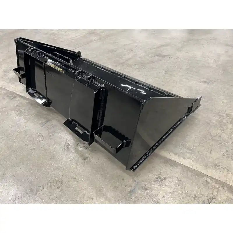 Black steel skid steer material bucket attachment with reinforced side panels and smooth angled rear edge on concrete surface