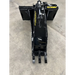Black skid steer stump bucket grapple attachment with single hydraulic cylinder and three flat digging teeth on concrete surface