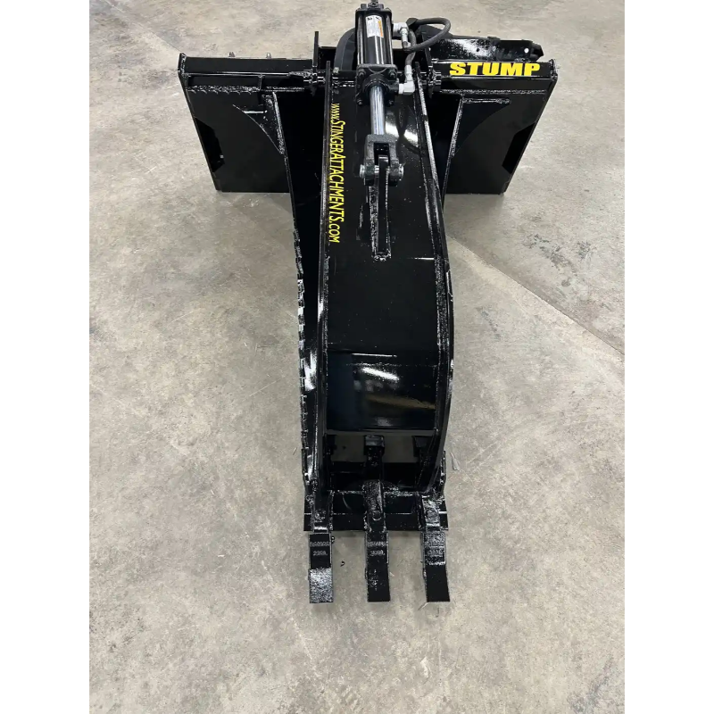 Black skid steer stump bucket grapple attachment with single hydraulic cylinder and three flat digging teeth on concrete surface