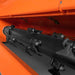 close-up underside view of black rotor shaft and flail blades inside orange MechMaxx 63-inch PTO mower gallery position 1