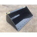 Front-right angled view of a black steel skid steer material bucket with reinforced cutting edge on gravel surface