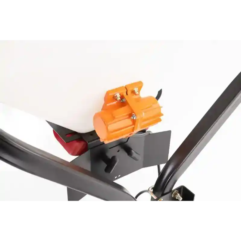 Close-up of orange vibrator motor mounted on black steel frame with white hopper above, gallery position 1