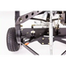 Close-up of metal frame, adjustment lever, pneumatic tire, and mounting hardware on Swisher 52-Gallon Tow-Behind Spreader gallery 1