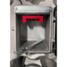 Close-up of MBW 500M ScreeDemon 18V battery-powered vibratory wet screed battery compartment with red release latch, gallery position 1