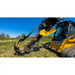 Stinger Attachments BF Bigfoot 900 Skid Steer Trencher mounted on yellow skid steer, gallery image 3, 800x800 square