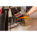 Close-up of operator's gloved hand pressing control switch on Swisher 22-Ton Timber Brute Eco Split electric log splitter, gallery position 1