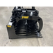 Black painted steel skid steer grapple attachment with curved tines, hydraulic cylinder, and reinforced side plate on concrete floor