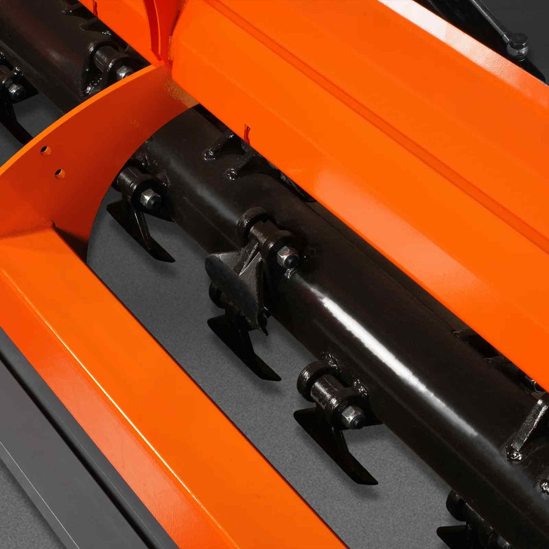 close-up of black rotor and flail blades inside orange MechMaxx 78-inch 3-point PTO ditch bank mower at gallery position 1