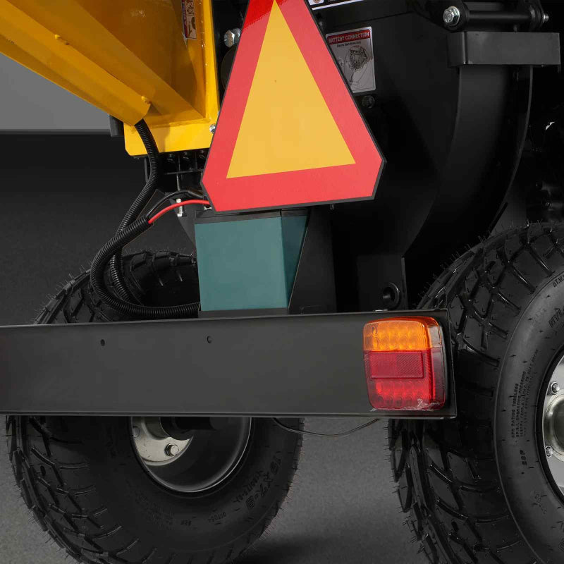 Close-up of MechMaxx 5 inch disc wood chipper rear tow bar with safety triangle and red brake light gallery position 1