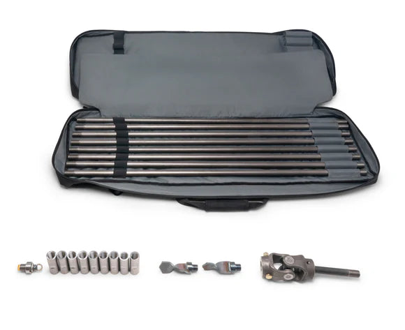 Set of metal drill rods, fittings, and coupling components arranged inside open soft carrying case, gallery position 1