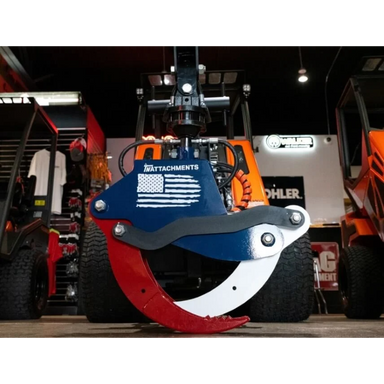 Rotating grapple attachment with red, black, and white curved steel claws and American flag decal on blue mounting plate
